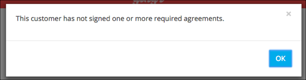 Unsigned agreements notification with OK button.